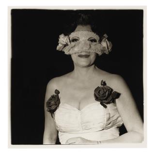 Diane Arbus - Lady At A Masked Ball With Two Roses On Her Dress, N.Y.C., 1967