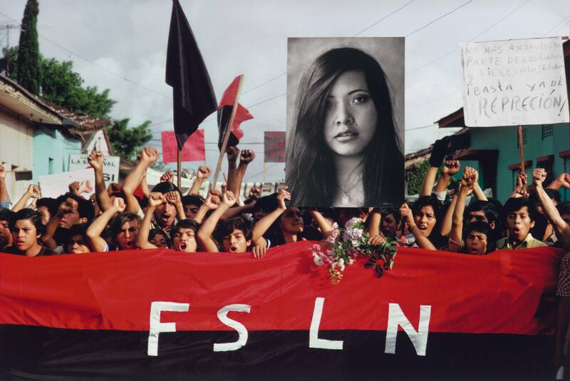 Susan Meiselas, A Funeral Procession in Jinotepe for Assassinated Student Leaders. Demonstrators Carry a Photograph of Arlen Siu, an FSLN Guerilla Fighter Killed in the Mountains Three Years Earlier, 1978